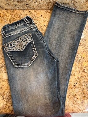 Women's Light Blue Boot Cut Jeans with Embellished Pocket